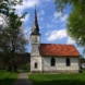 Die Kirche im Sommer (FrankBothe, CC BY-SA 4.0, https://commons.wikimedia.org/w/index.php?curid=36712300)